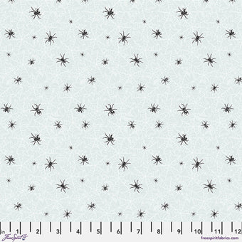 aqua cotton fabric with glow in the dark spider webs and black spiders halloween