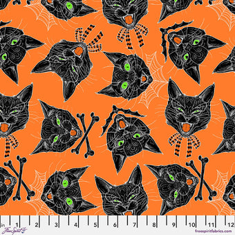 orange cotton fabric with black cat faces and spider webs halloween