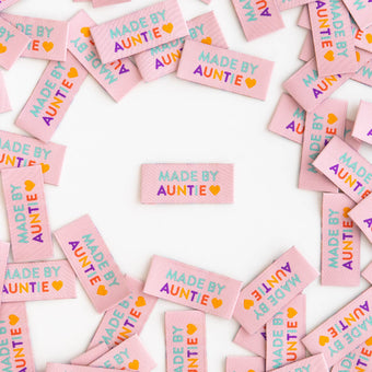 pink woven sew-in labels with "made by auntie" by sarah hearts