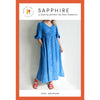 Sewing pattern cover for 'SAPPHIRE' by Rae Hoekstra, featuring a model wearing a blue and white vertically striped midi dress. The cover has an orange border and includes a 'Made by Rae Sewing Patterns' logo.