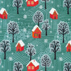 organic cotton fabric with green background of snowy forest and red cabins