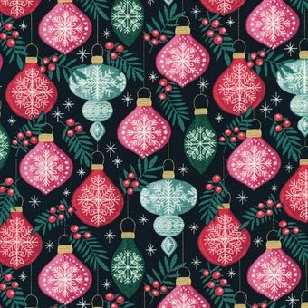 organic cotton fabric with black background and red and green christmas ornaments