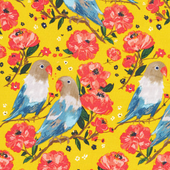 bright yellow matte laminate organic cotton fabric with coral flowers and blue birds