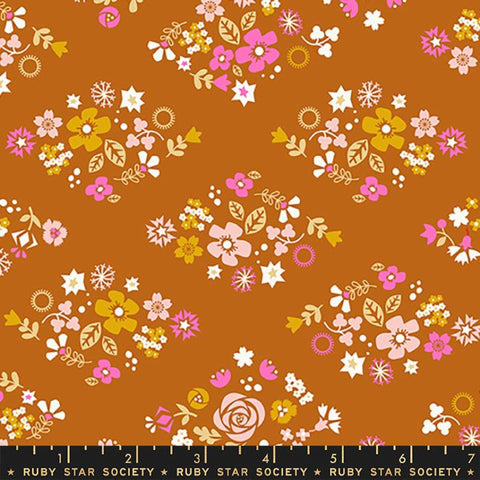 caramel brown cotton fabric with pink and mustard yellow calico diamond design