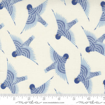 cream cotton fabric with flying blue birds