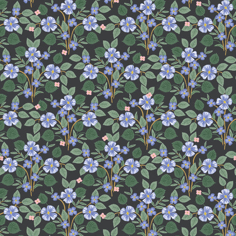 black cotton fabric with blue pansy floral design.  Bramble by Rifle Paper Co.
